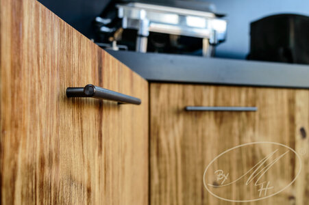 Material: patinate solid wood, oil. Detail of outdoor kitchen.